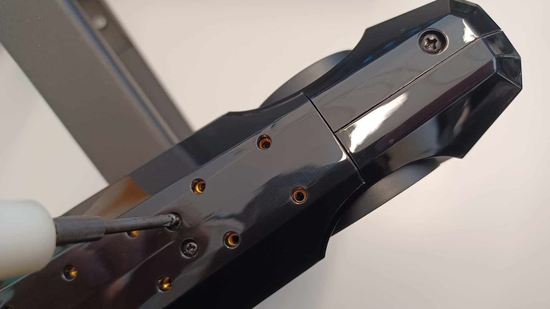 Remove the stock top plate screws.
