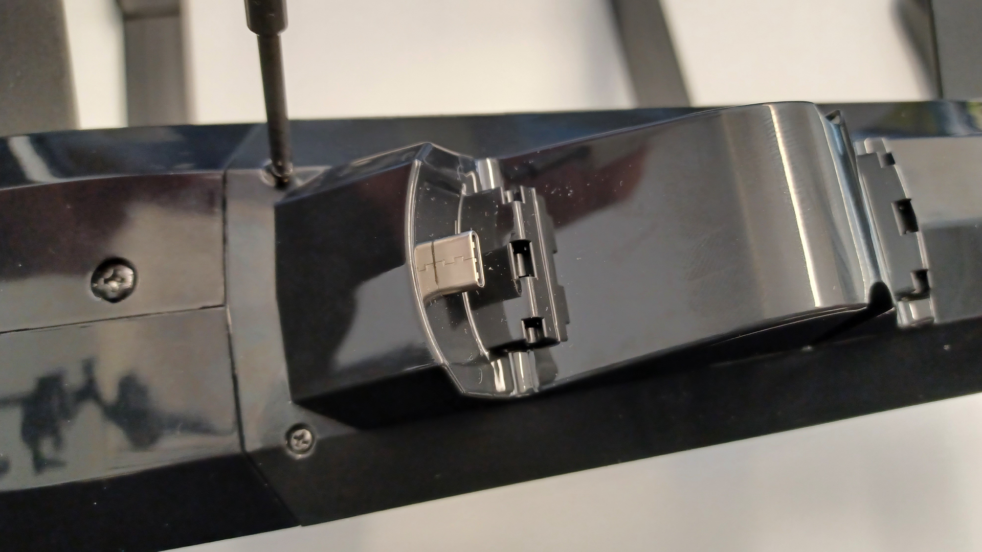 Secure the tracker mount with screws.